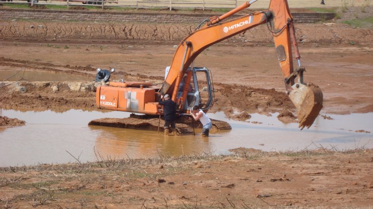 heavy equipment at the water feature on the new section by the hospital