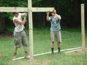 my boys fence-building for Uncle Eric